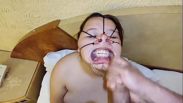 She loves the cock and balls on her bondage face